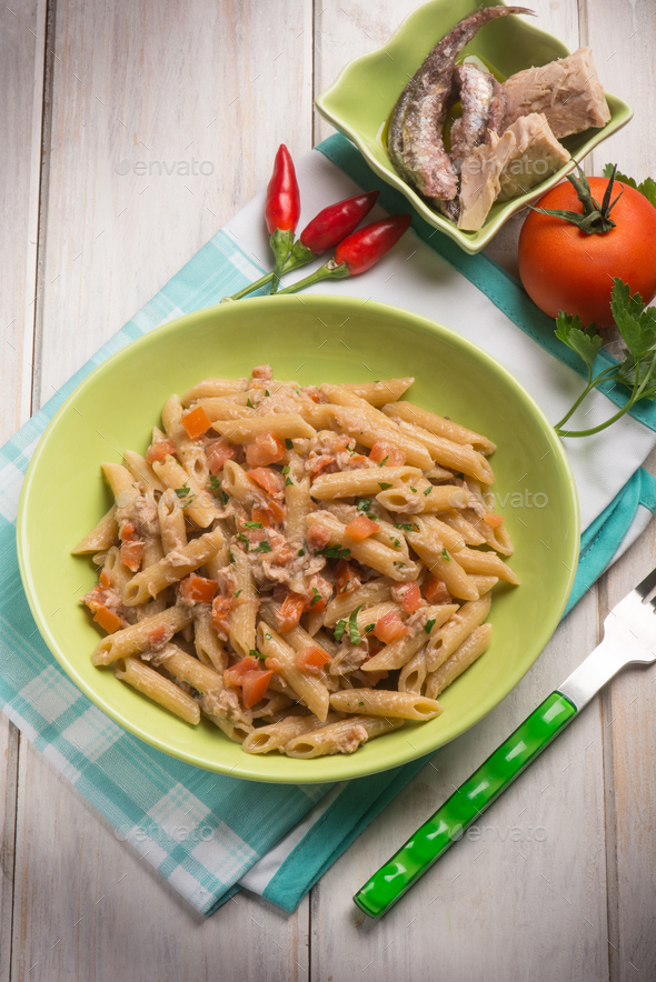 pasta with tuna anchovies tomato and hot chili pepper Stock Photo by
